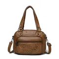Brown washed leather motorcross handbag with woven details and punk style metal rivets - Woven Heart Style (838-3) / Brown