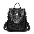 Black leather backpack for women with 3D floral quilting and silver metal hardware - Black