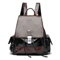 Mochila de cuero bicolor en marrón y negro con cordón ajustable y hebilla metálica - café