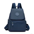 Mochila pequeña de nailon azul oscuro resistente al agua con correas ajustables y bolsillo - Azul