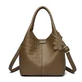Dark brown leather bucket bag featuring mixed crocodile and litchi textures with bear charm - Crocodile Pattern Grey