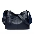 Classic navy blue leather crossbody bag with multi-pocket design and wide shoulder strap - Blue