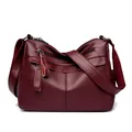 Classic wine red pebble leather crossbody bag with multiple zipper pockets and wide strap - Red
