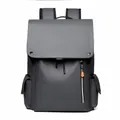 Dark grey waterproof laptop backpack in coated leather with orange zipper accents - Dark Gray