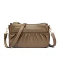 Brown pleated leather crossbody bag with grainy texture and golden metal hardware - Elephant Gray