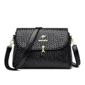 Black woven texture crossbody bag with gold kangaroo logo and adjustable strap - Black