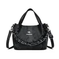 Sac seau noir chic en cuir gaufré serpent avec chaîne argentée et bandoulière réglable - Noir