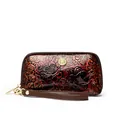Vintage reddish-brown leather wallet with embossed peony pattern and gold zipper detail - Red