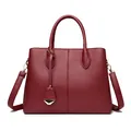 Minimalist burgundy leather tote bag with lychee texture and golden metal hardware details - Red