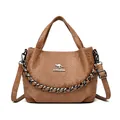Brown faux snakeskin leather bucket bag with chain detail and metallic kangaroo emblem - Yellow Brown