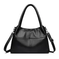 Classic black litchi pattern leather tote bag with cross-stitch design and silver metal hardware - Black