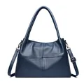 Minimalist navy blue pebble leather tote bag with crossbody strap and silver hardware - Blue