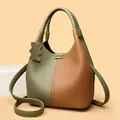 Green and tan leather bucket bag with pebble texture and cute bear charm pendant - Yellow-Green
