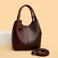 Litchi texture leather tote bag in wine red with bear charm and long shoulder strap - Brown Red
