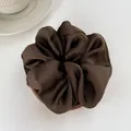 Close-up of a high-quality silk satin scrunchie in deep coffee brown with smooth texture - L / Dark Coffee