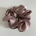 Elegant mauve satin scrunchie with silky pleated texture on a wooden stand - L / Korean Pink