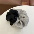 Detailed texture of black matte and grey tweed fabric splicing on the scrunchie - Apricot Black Splicing Hair Ring