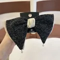 Barrette à cheveux avec nœud en tweed noir et gris avec breloques en strass - Pince à ressort à nœud noir