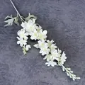 Artificial white larkspur flower with multi-head design on textured grey background - White
