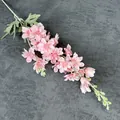 Artificial pink delphinium flower with realistic petals and green leaves for decor - Pink