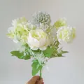 Handheld bridal bouquet with light yellow roses, white hydrangeas and green foliage - Green Peony Hydrangea