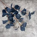 Artificial deep blue eucalyptus branch with white berry details on grey background - Ink Blue