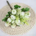 Artificial white tea rose flower bouquet with mini buds and green leaves on a straw mat - White