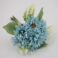 Artificial bouquet of light blue daisies with green leaves and yellow spikes on white - Blue