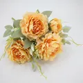 Artificial peony bouquet in bright orange yellow silk with green leaves for decor - Orange
