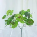 Artificial green plant bundle with patterned leaves in a clear glass vase - Design No.2