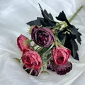 Vintage bundle of deep wine red and dusty pink artificial roses on silk background - Red