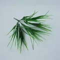 Artificial green pine needle sprig for home decor with vibrant needle-like leaves - Spring Leaves