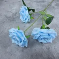 Single stem artificial blue rose with three lifelike flower heads and green leaves - Blue
