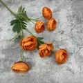 Ramo artificial con siete cabezas de flores de camelia en seda naranja y hojas verdes - Naranja