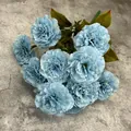 Light blue artificial carnation bouquet with 13 silk flower heads on grey surface - Blue