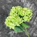 Artificial green hydrangea bouquet with lifelike petals for home or wedding decor - Green