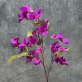 Artificial bougainvillea branch in vibrant magenta with green leaves and realistic stem - Purple