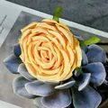 Artificial orange-yellow silk rose flower head with pink edges and green sepals - Ginger Yellow