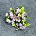 Faux bouquet of purple and light pink ranunculus buds with green leaves for decor - Autumn Purple