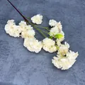 Single long stem artificial carnation with dense white petals and green leaves - Magic Champagne