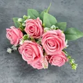 Artificial pink rose bouquet with realistic green leaves on a dark grey background - Rose Pink