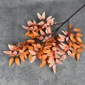 Branche d'eucalyptus artificielle aux feuilles réalistes dégradées orange et rose - Orange