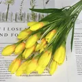 Vibrant yellow artificial tulip bouquet with lush green leaves for home decor - Yellow