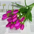 Lifelike artificial purple tulip bouquet with silk petals and green foliage for decor - Purplish Red