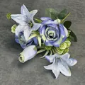 Artificial bouquet with blue lilies and purple roses on grey textured background - Dark Blue