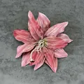 Dark pink handmade lily hair clip with realistic petals and stamens on grey fabric - Carmine