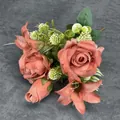 Artificial bouquet with coral roses and lilies on dark textured background - Tan