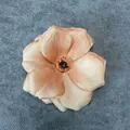 Elegant champagne gold silk hibiscus flower head with detailed multilayered petals - Camel