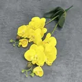 Artificial yellow moth orchid branch with realistic petals and green leaves for decor - Yellow