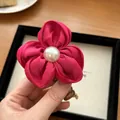 Hot pink fabric flower hair scrunchie with center pearl and telephone cord spiral - Pink